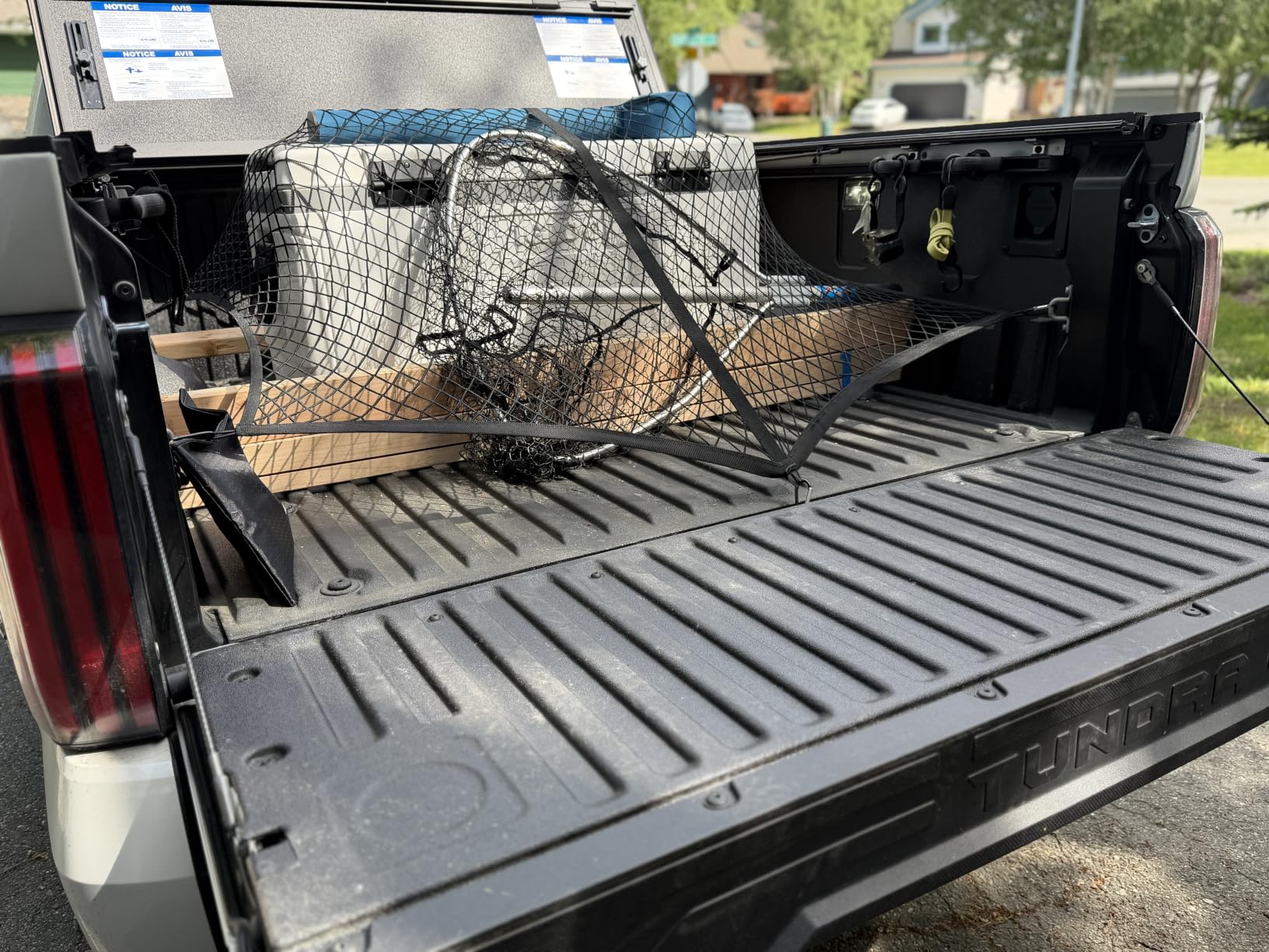 AUTOWN Cargo Net for Pickup Truck Bed - Stretchable 4'x4' to 7'x7', High Elastic Fine Mesh 1''x1'' with 8 Metal Carabiners - Ideal for ATV, SUV, UTV, Truck and Boat Use customer photo 1