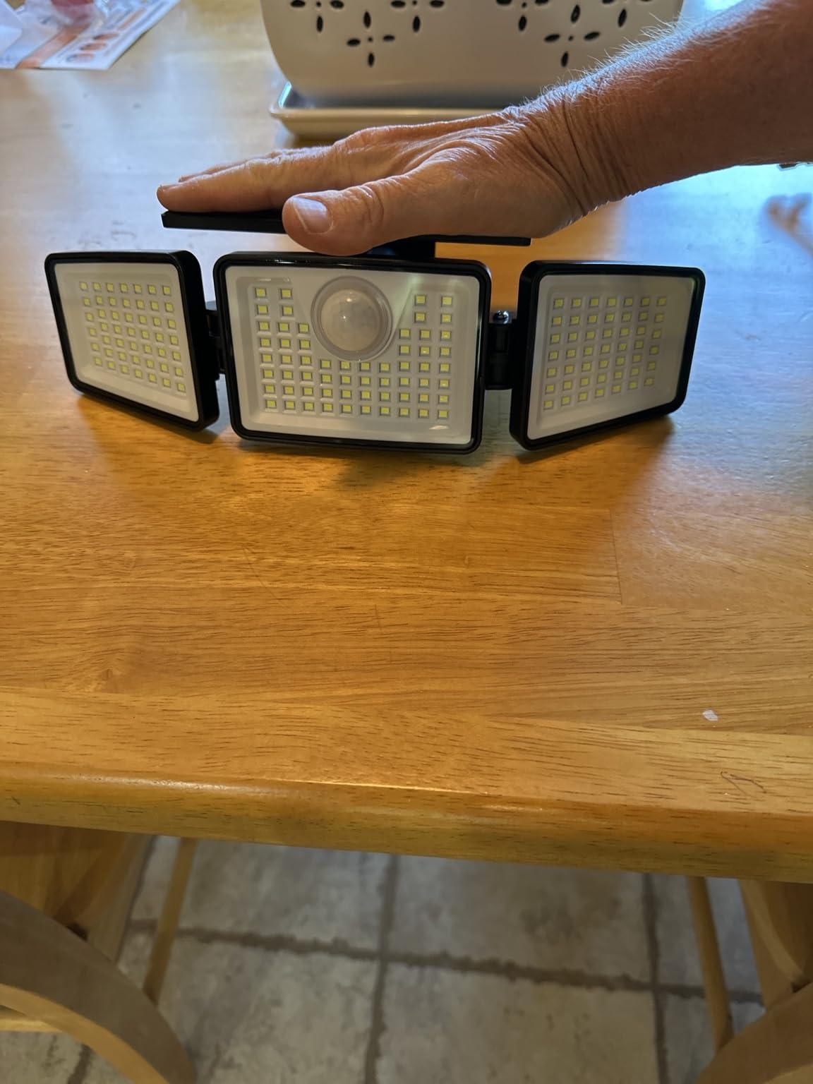 daphino 2500LM Solar Lights Outdoor with Motion Sensor, 3 Head 270° Wide Angle Street Area Lights, IP65 Waterproof, 3 Modes (2 Pcs) customer photo 1