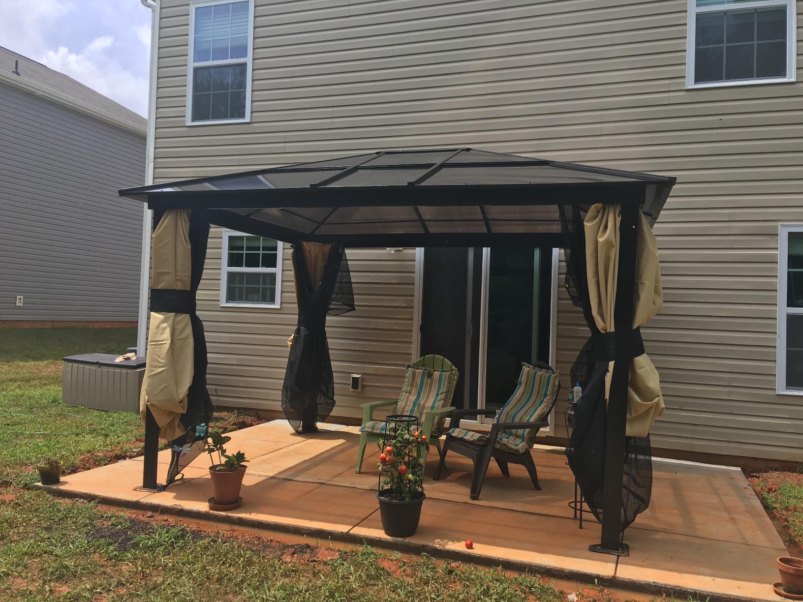 Outsunny 10' x 12' Hardtop Gazebo Canopy with Polycarbonate Roof, Aluminum Frame, Permanent Pavilion Outdoor Gazebo with Netting, for Patio, Garden, Backyard, Deck, Lawn, Gray, Brown customer photo 2