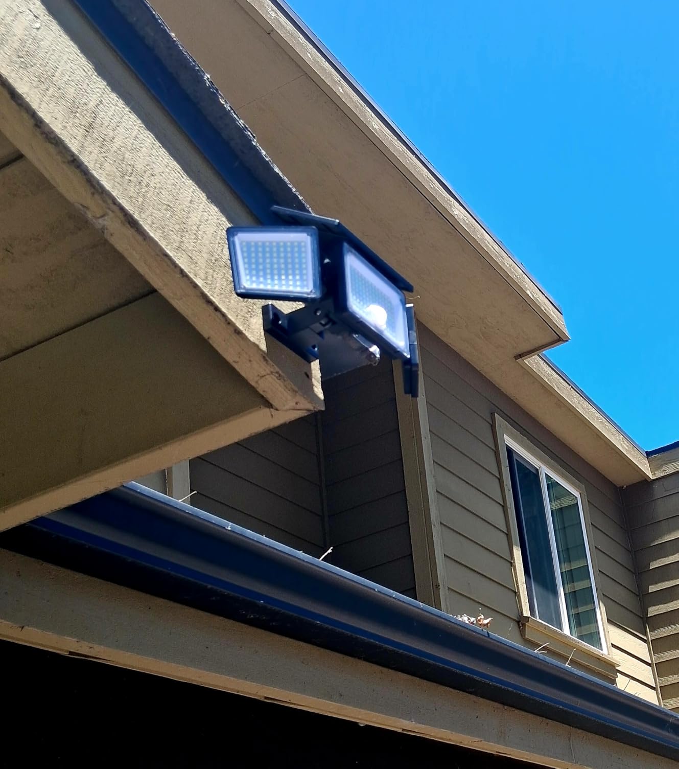 Solar Outdoor Lights Motion Sensor, 2500LM 286 LED Security Flood Lights with Visual Battery & Mode Display, 3 Lighting Modes, IP65 Waterproof 3-Head Wide Angle for Garage, Yard, Patio (2 Pack) customer photo 1