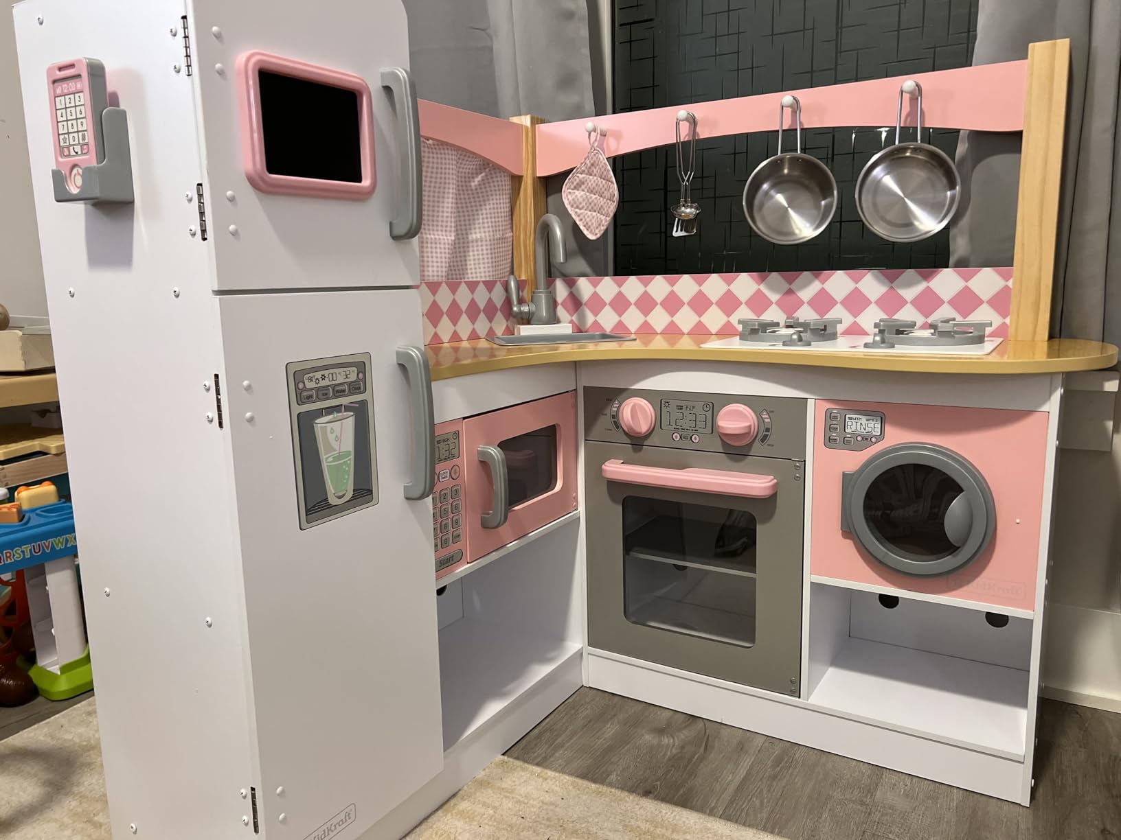 KidKraft Grand Gourmet Corner Wooden Play Kitchen with Washer, Chalkboard, Curtains and 4 Accessories, Gift for Ages 3+ customer photo 2