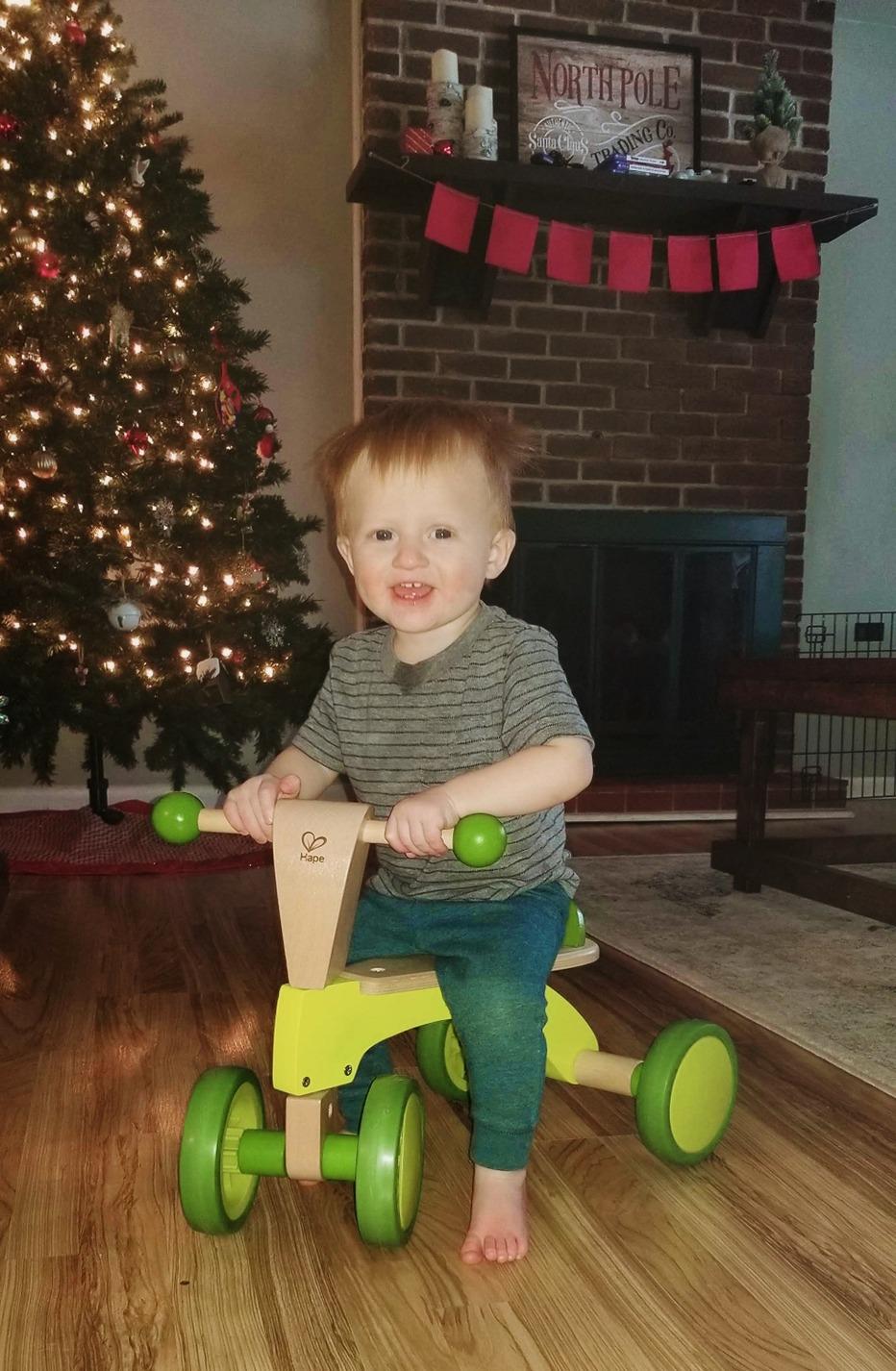 Hape Scoot Around Ride On Wood Bike | Award Winning Four Wheeled Wooden Push Balance Bike Toy for Toddlers with Rubberized Wheels, Bright Green customer photo 1