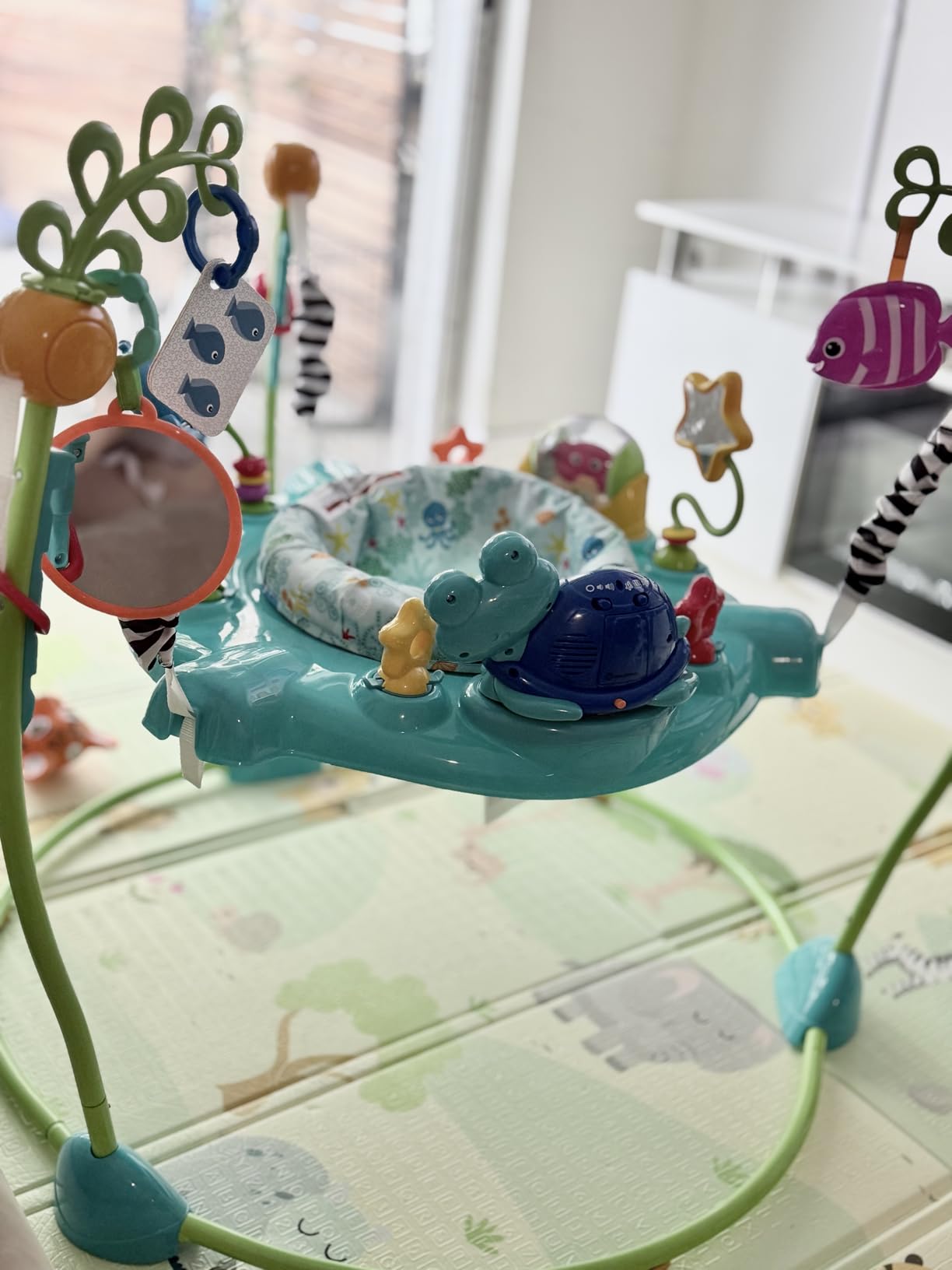Baby Einstein Neptune's Ocean Discovery Activity Baby Jumper Activity Center, Ages 6 Months +, Max Weight 25 lbs., Unisex customer photo 1