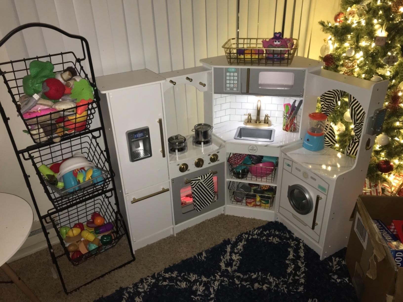 KidKraft Ultimate Corner Wooden Play Kitchen with Lights & Sounds, Play Phone and Curtains, White customer photo 2