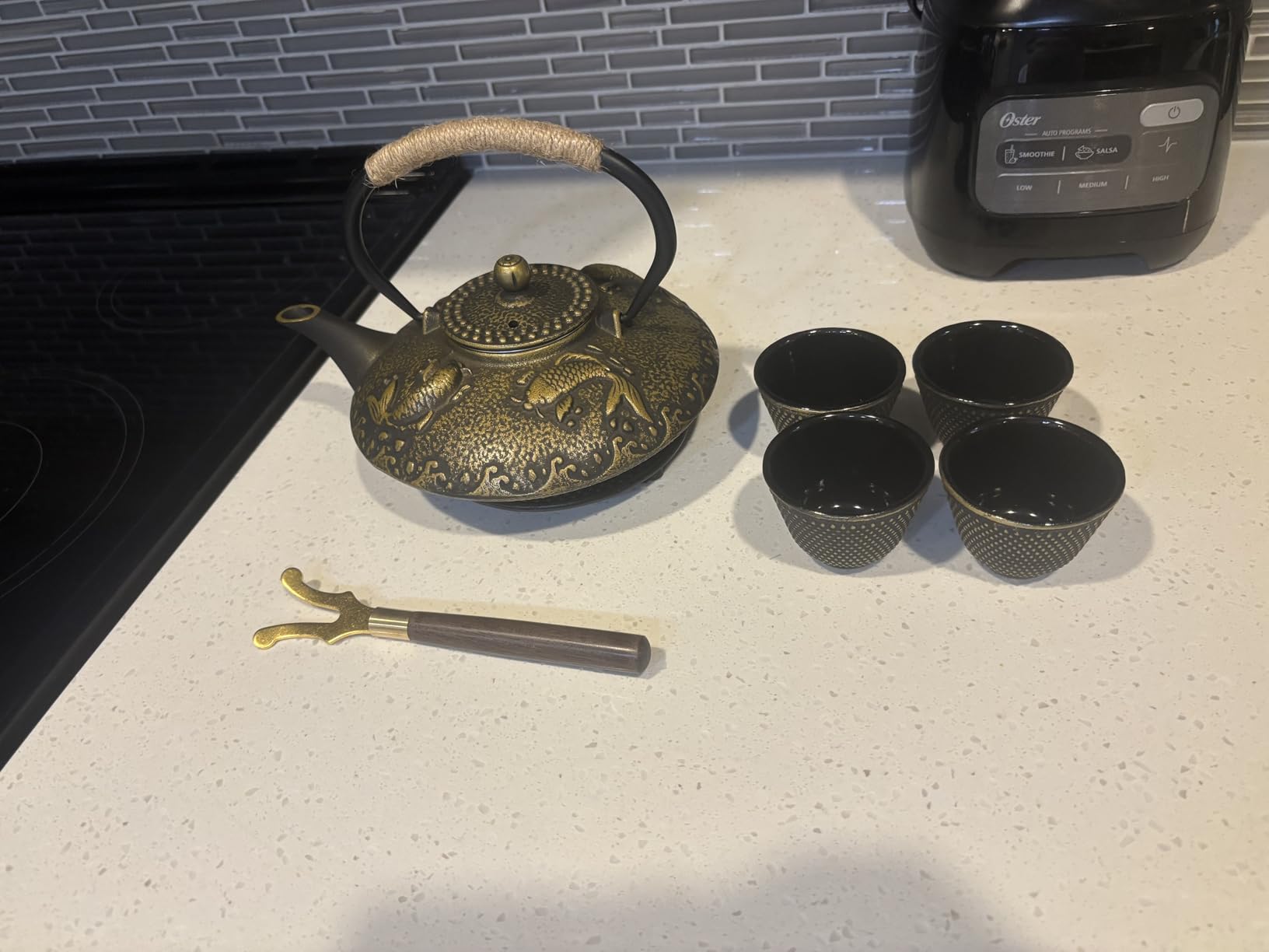 Ufine Blue Floral Cast Iron Teapot Set 28 oz Tea Kettle with 4 Cups, Trivet, Japanese Style Tetsubin for Stove Top with Stainless Steel Infuser customer photo 1