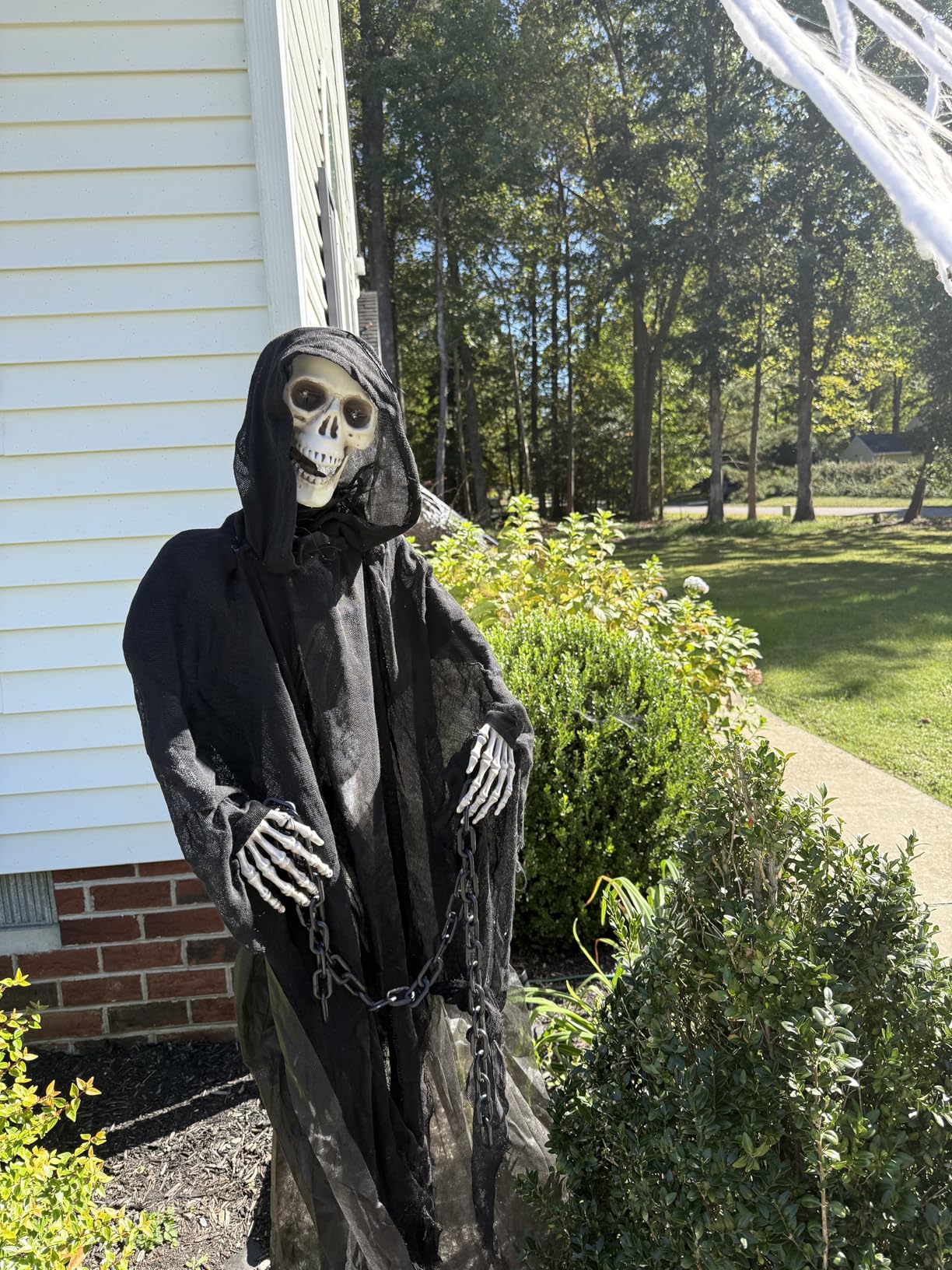 Haunted Hill Farm Life-Size Scary Grim Reaper with Chain, Halloween Animatronic with Touch Activated Lights and Sounds, Battery Operated Indoor or Covered Outdoor Halloween Decorations customer photo 2