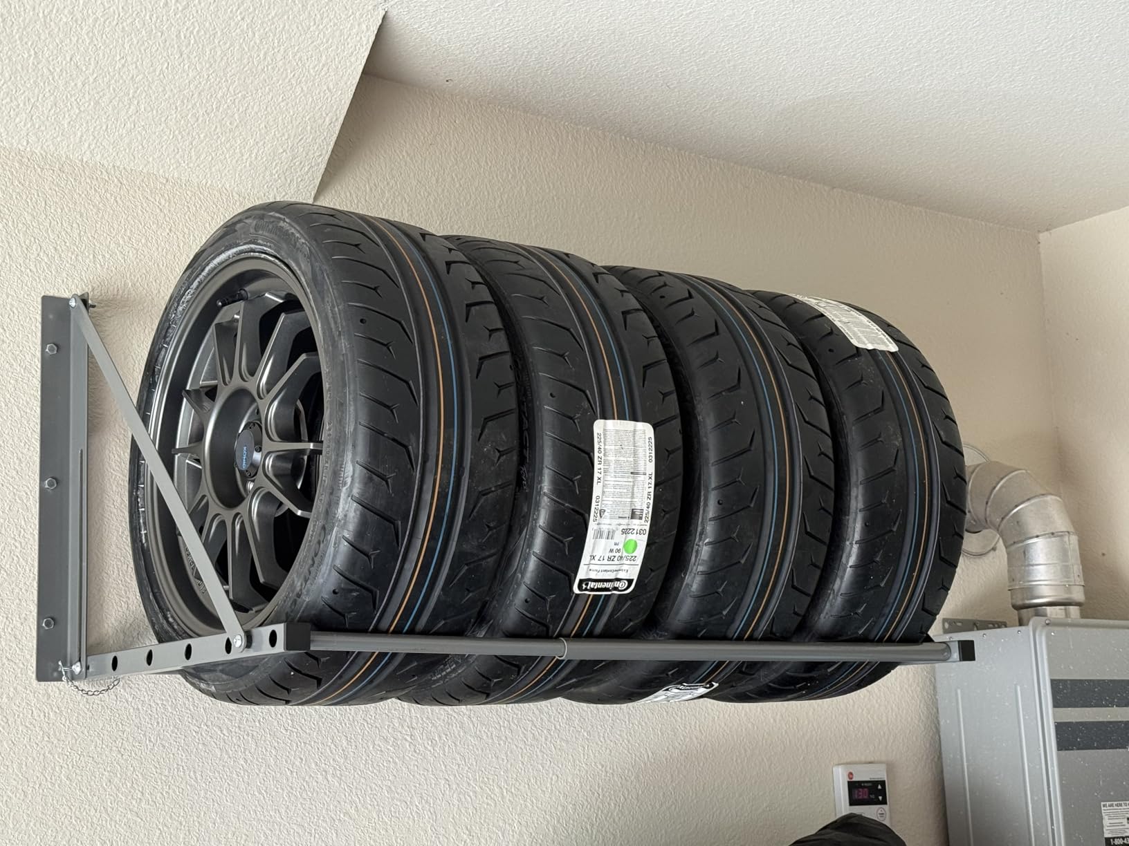 MaxxHaul 50256 Heavy-Duty Adjustable Wall-Mount Tire Storage Rack - Telescoping 32-48