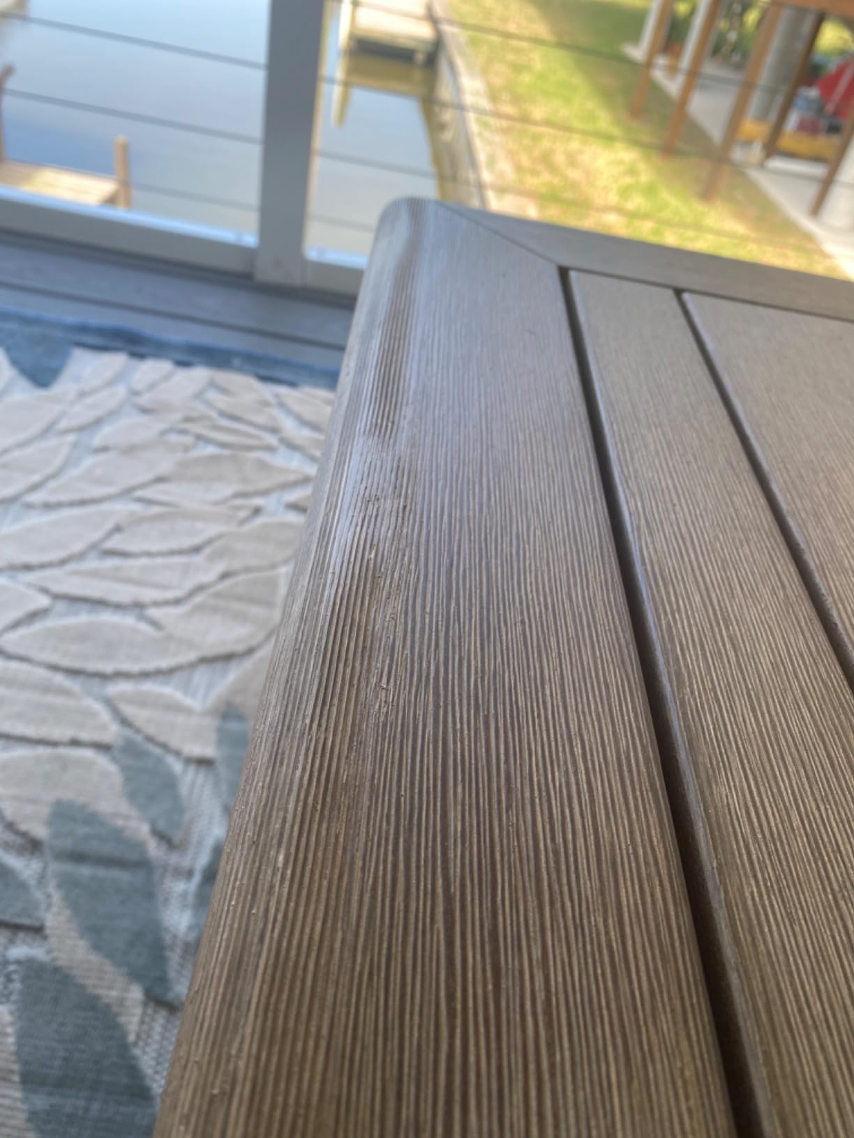 Signature Design by Ashley Wood Outdoor Coffee Table, Grayish Brown | Weather resistant eucalyptus wood, 5-step protective coating, Slatted top sheds rainwater, 50-in width, Gerianne Series customer photo 1