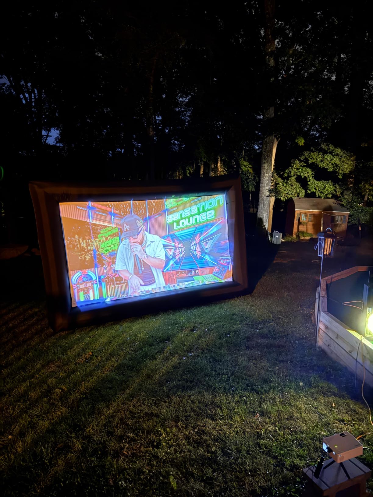 GYUEM 20 feet Inflatable Portable Projector Movie Screen - Huge Air-Blown Cinema Projection Screen Package with Rope, Blower, Tent Stakes - Front & Rear Projection, for Outdoor Party Backyard Pool Fun customer photo 1