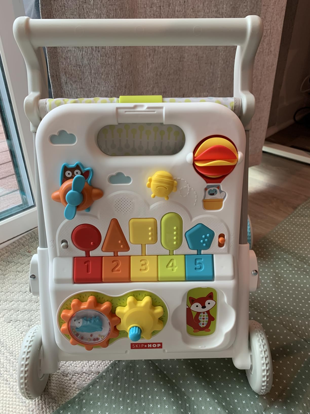 Skip Hop Baby Walker 4-in-1 Sit to Stand Convertible Light Up Walker with 40+ Activities Explore & More Age 6m+ customer photo 1