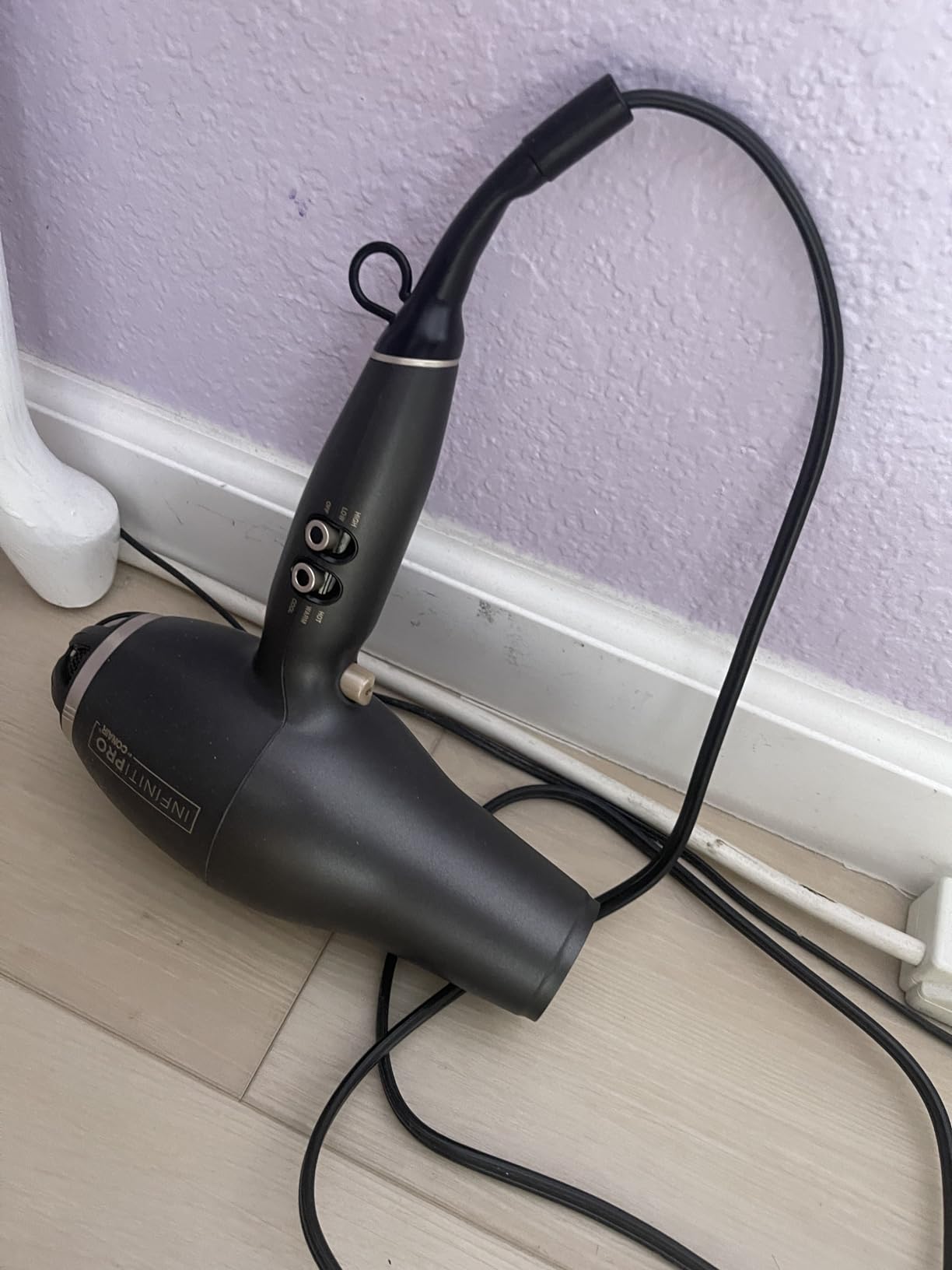 INFINITI PRO CONAIR FloMotion Pro Hair Dryer, Personalize Your Drying Experience with Adjustable Airflow and 6 Heat/Speed Settings, Blow Dryer with Diffuser and Concentrator Attachments, Black customer photo 2