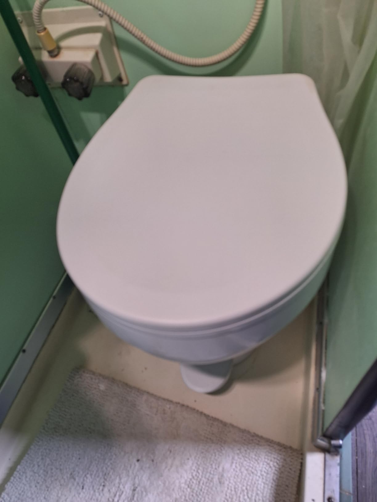Thetford Aqua-Magic VI High Profile, White | Space-saving design, easy installation, foot flush, Residential sized SloClose seat, deepest toilet bowl available for RVs customer photo 2