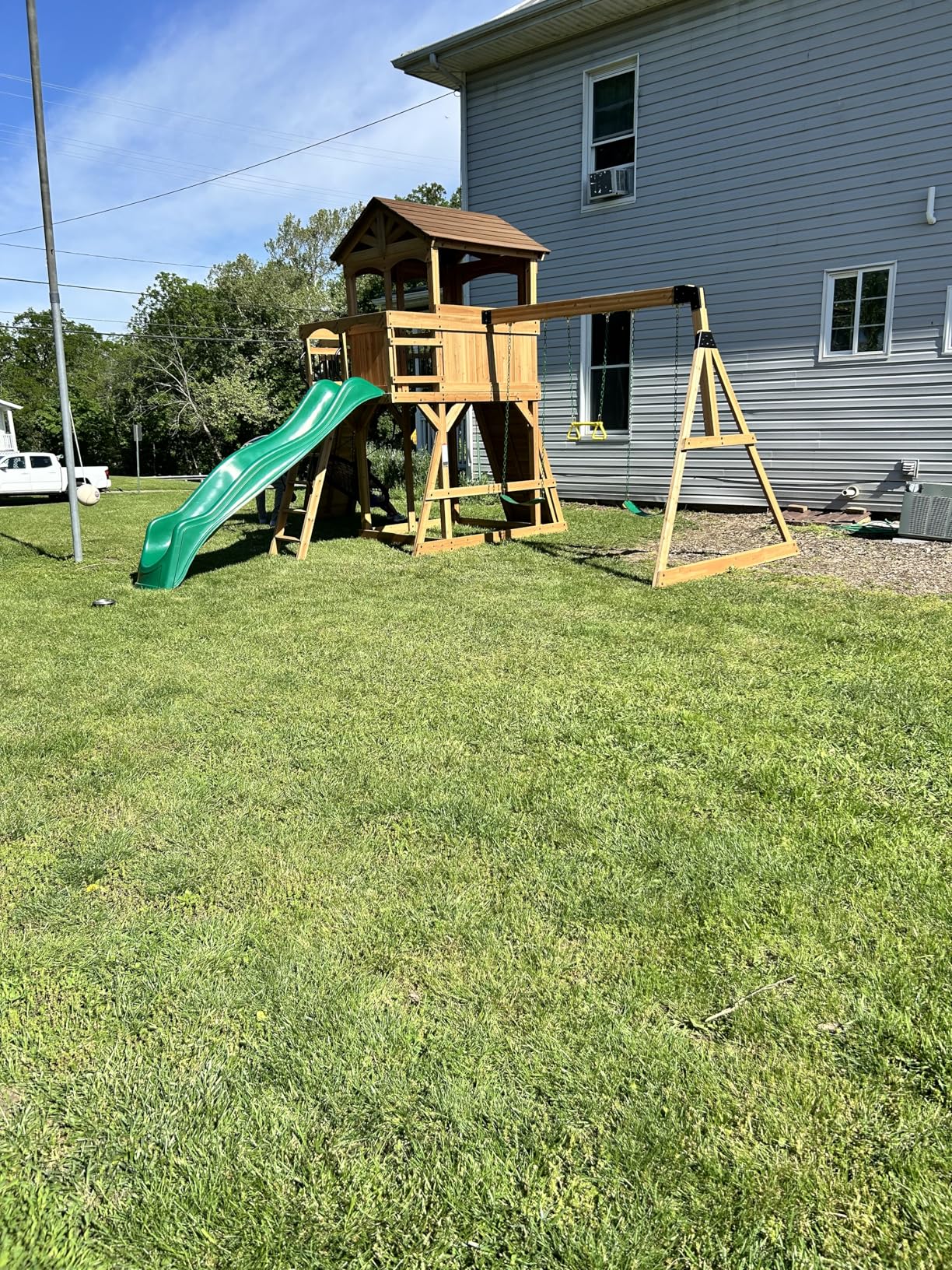 Backyard Discovery Sterling Point Cedar Wood Swing Set with Wave Slide, Raised Clubhouse, Wooden Bridge, Rock Wall, Belt Swings, Web Swing, Trapeze, Balcony, Climbing Wall, Ladder, Outdoor Playset customer photo 1