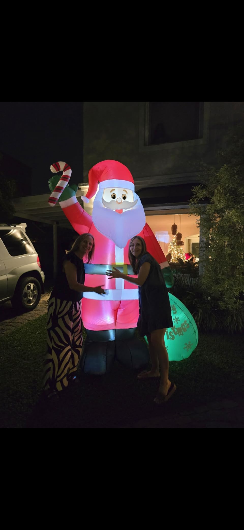 8 FT Christmas Inflatable Santa Claus with Candy and Big Gift Bag Outdoor Decor, Blow Up IP44 Weatherproof Xmas Decorations for Yard, Built-in LED Light for Garden Lawn Indoor Winter Holiday customer photo 1