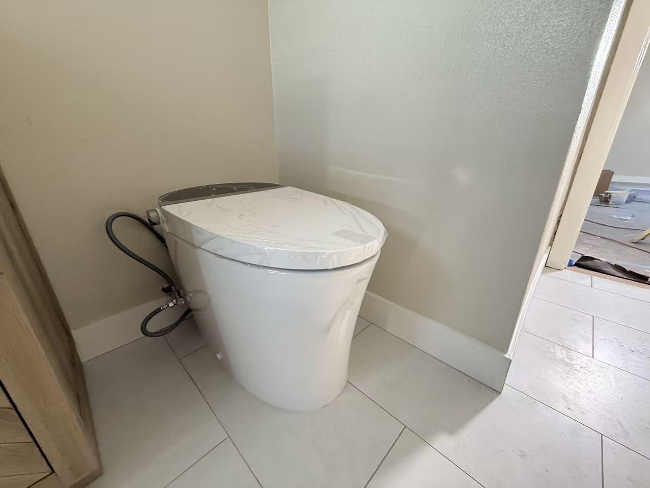 CANEST Smart Toilet, Smart Toilet with Bidet Built in, ADA Comfort Height, Intelligent Temp Control, Foot Sensor Operation, Warm Water, Heated Seat, Air Dryer, Digital Display (TC-100GE) customer photo 2