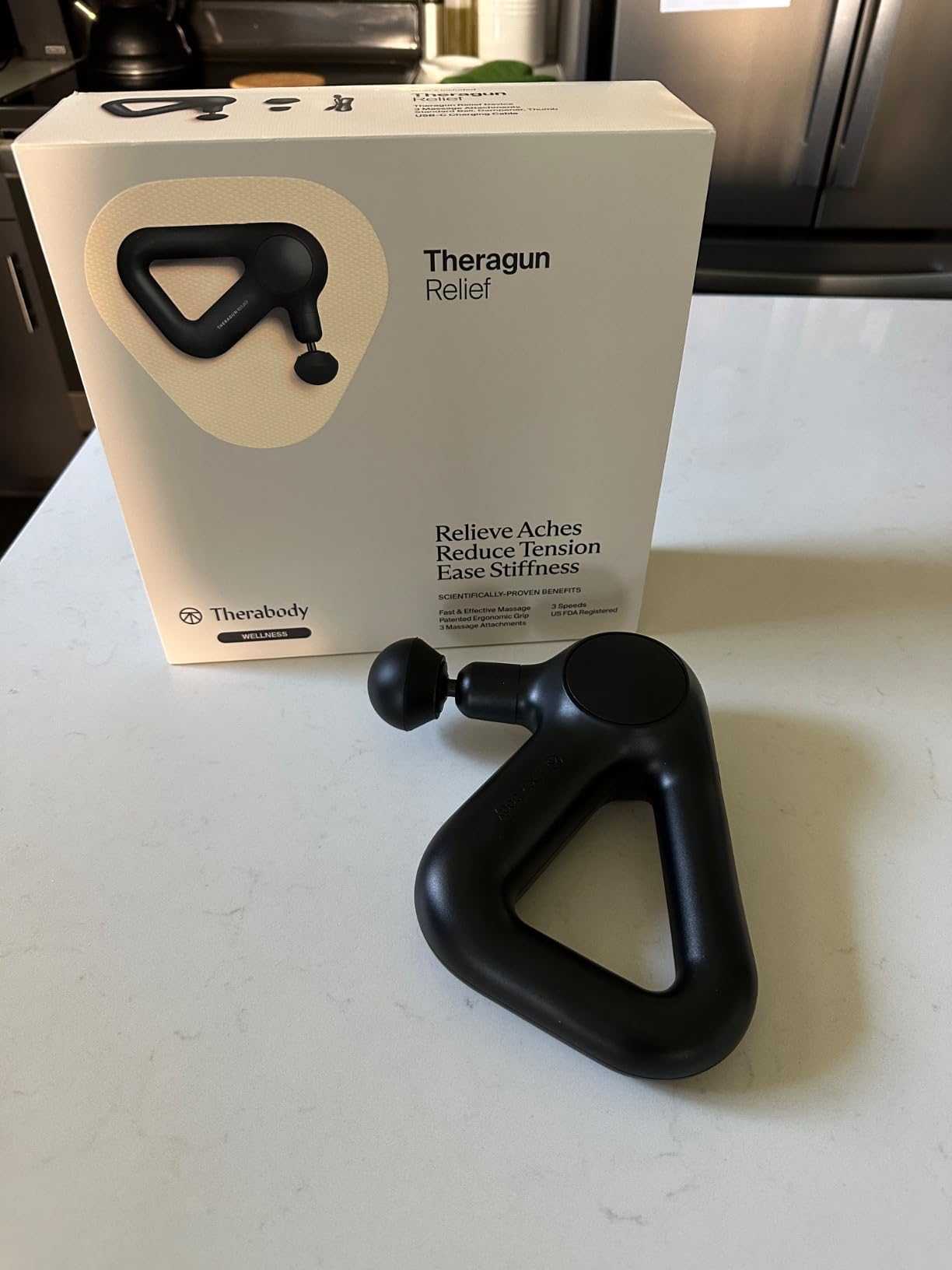 TheraGun Therabody Relief Massage Gun | for Daily Comfort | 3-Speed | Navy | Quiet Handheld Percussion Muscle Massager for Back, Leg & Shoulder Pain Relief. Lightweight, Easy to Use, Ergonomic Grip customer photo 1
