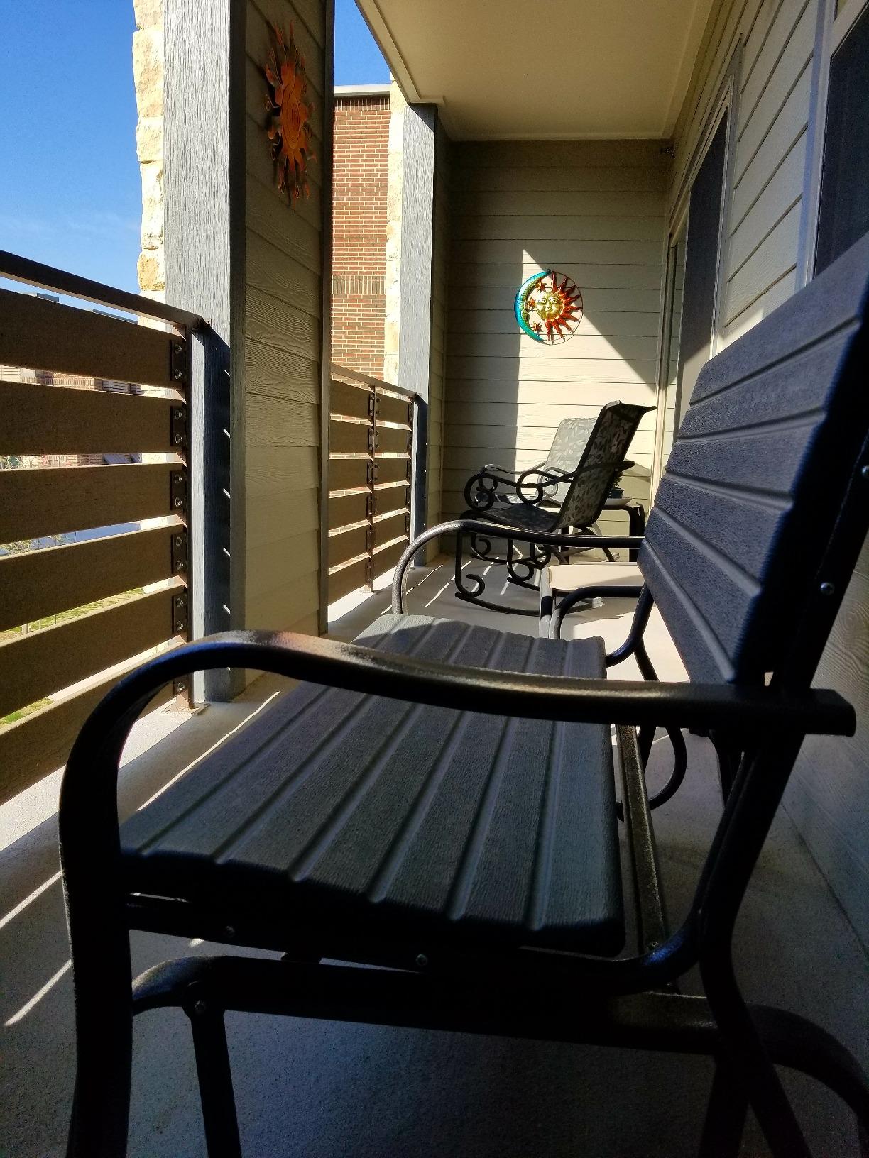Giantex Outdoor Gliders for Outside Patio - Porch Glider w/Steel Frame, Weather Resistance HDPE Back & Seat, 600Lbs Capacity Loveseat, 2-Seat Rocker for Deck, Yard, Lawn, Outdoor Glider Bench (Brown) customer photo 1