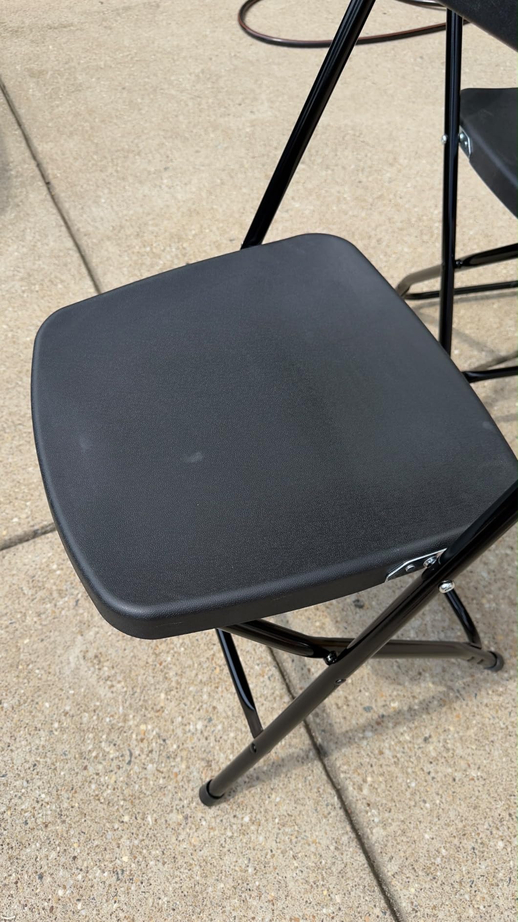 50 Pack Black Plastic Folding Chairs, Steel Frame, 350lb | HDPE plastic and steel frames; foldable, stackable chairs for indoor and outdoor weddings, parties, offices and events. customer photo 2