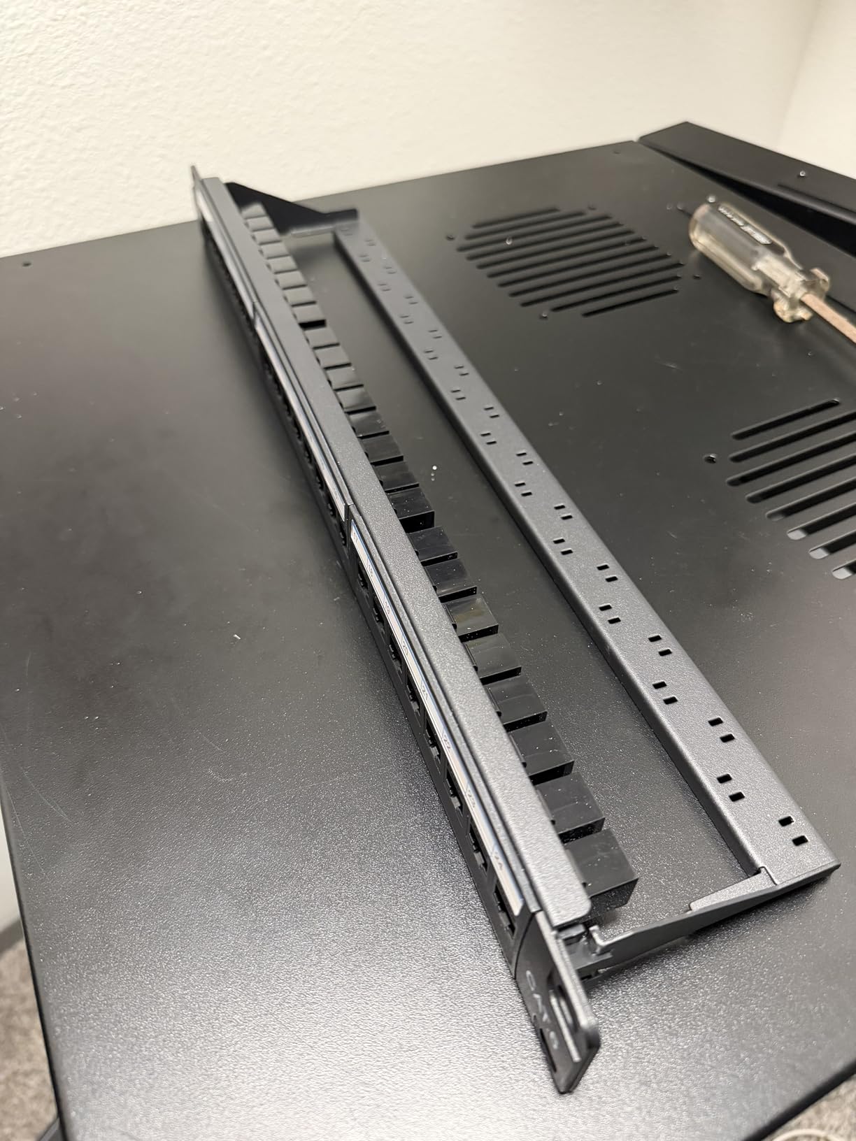 Jadaol [UL Listed] 24 Port Patch Panel Rackmount or Wall Mount 19-Inch 1U | Cat 6A Network Panel Preloaded with 24 Keystone Couplers plus 1 Spare, 10Gbps Ethernet Panel with Cable Management & Back Bar customer photo 2