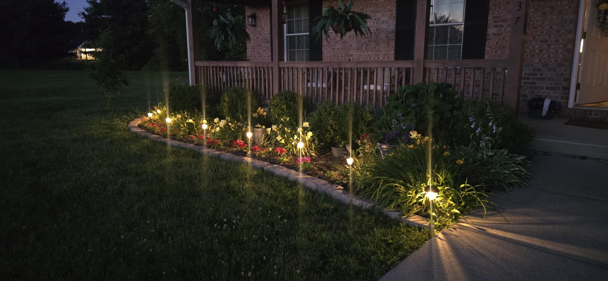 DERAYSION 8 Pack Solar Lights Outdoor, Stainless Steel Glass Solar Pathway Lights, Auto On/Off Long-Lasting Waterproof Garden Lights for Landscape, Path, Yard, Driveway, Walkway Decor (Warm White) customer photo 1