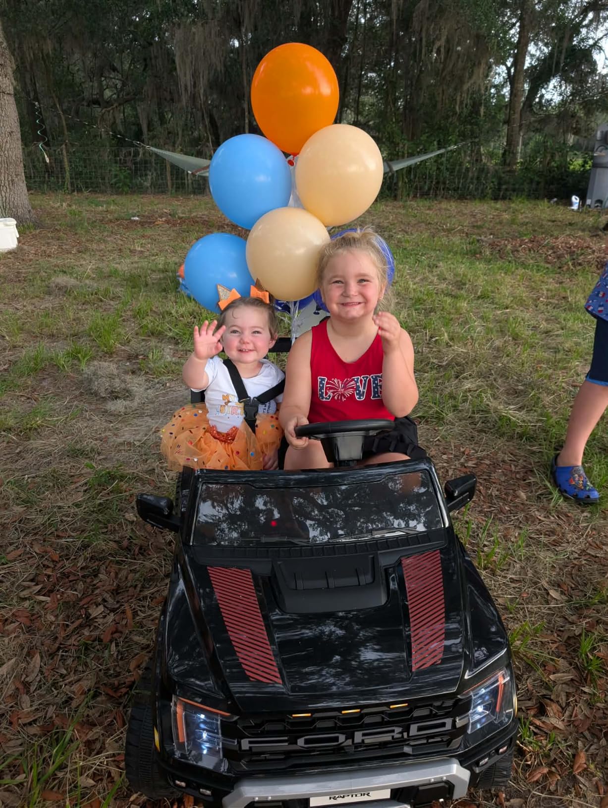 First Ride On 24V Kids Ride On Truck, Licensed Ford F-150 Raptor 2 Seater Electric Car w/Remote Control, Toddler Ride On Car Toys w/LED Lights, Bluetooth, Music, Truck Bed Storage, Soft Start (White) customer photo 1