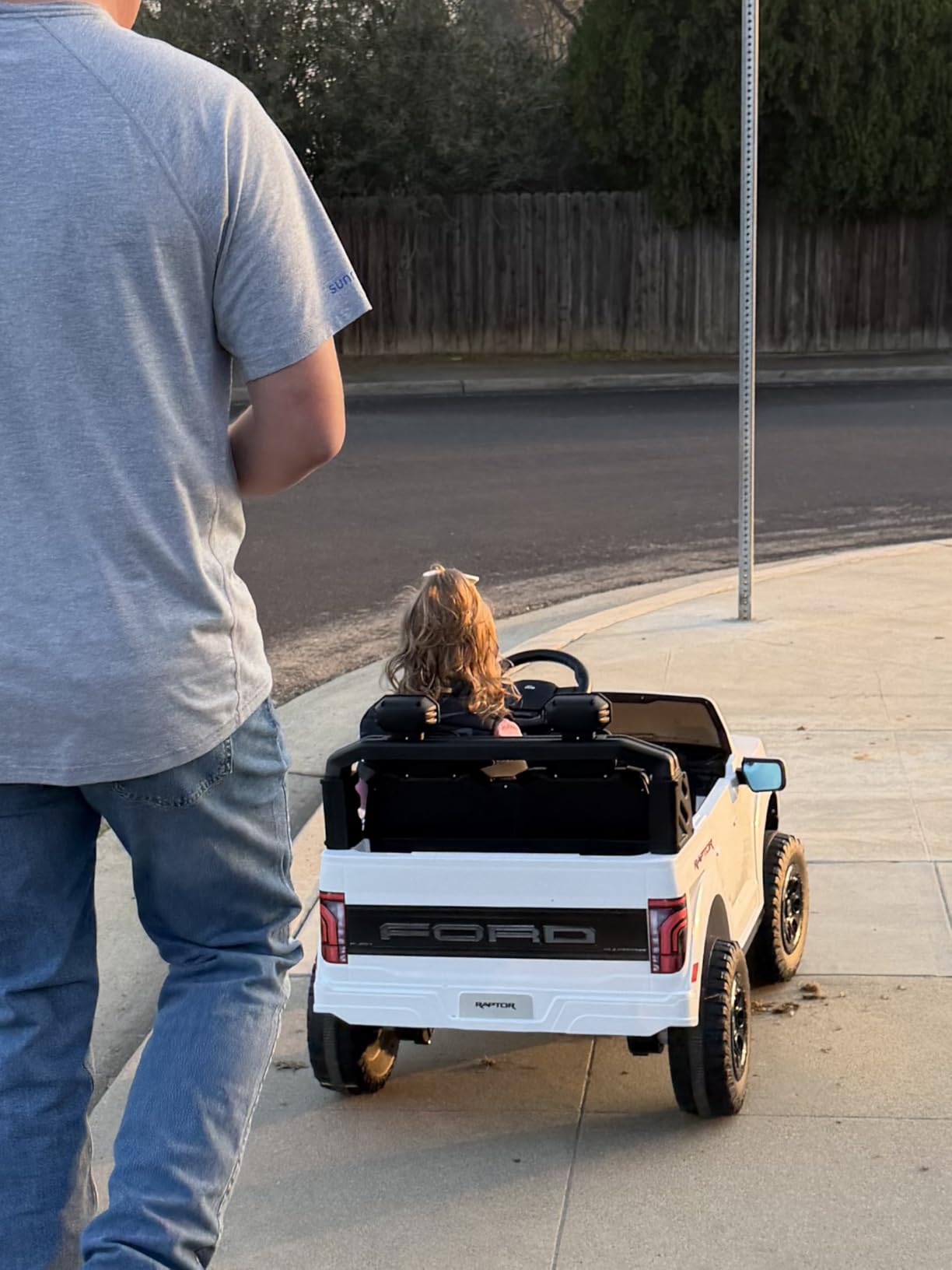 First Ride On 24V Kids Ride On Truck, Licensed Ford F-150 Raptor 2 Seater Electric Car w/Remote Control, Toddler Ride On Car Toys w/LED Lights, Bluetooth, Music, Truck Bed Storage, Soft Start (White) customer photo 2