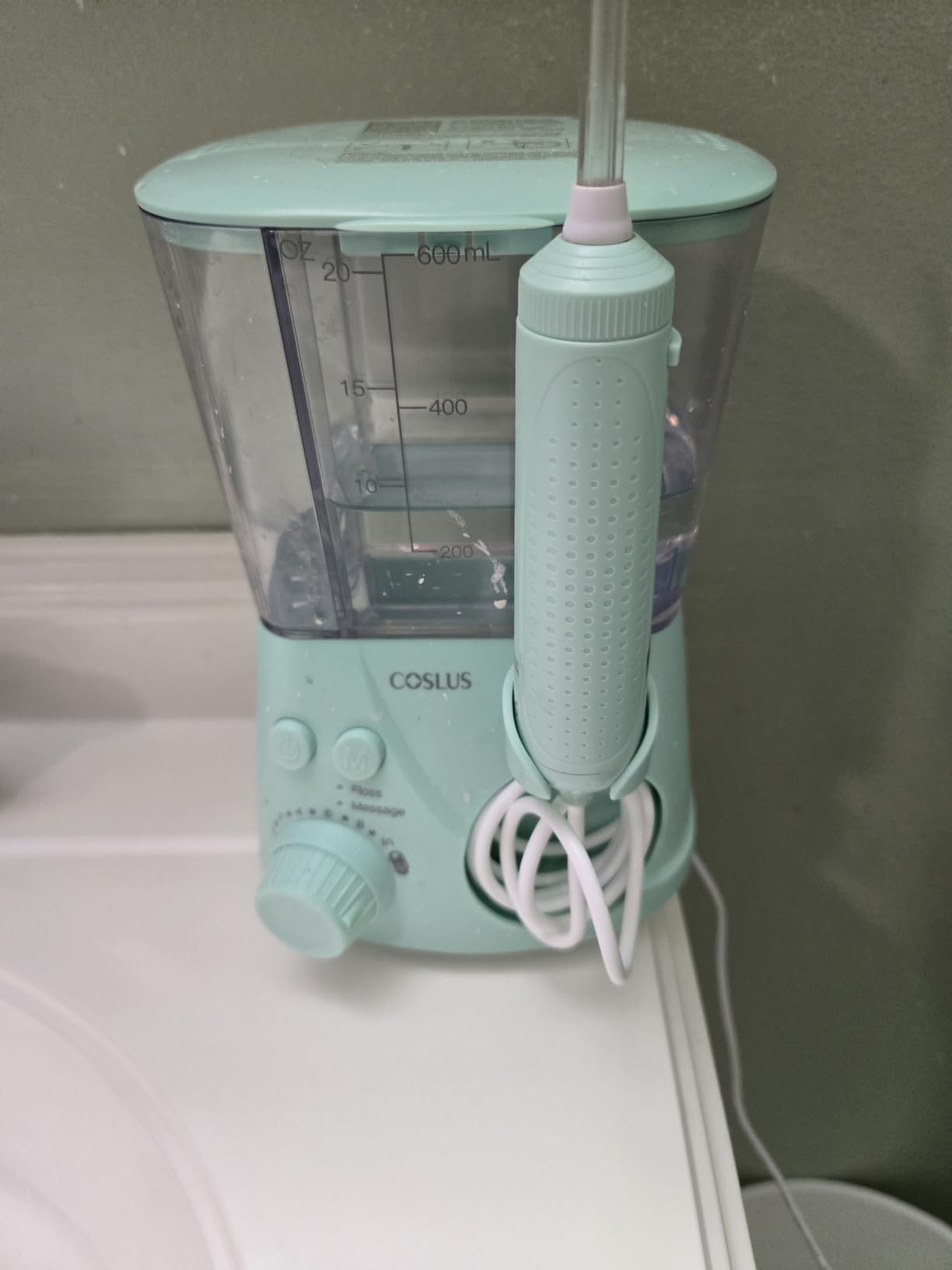 COSLUS E2 Water Dental Flosser for Teeth Cleaning, Multi-User Family Use | 12 Pressure Settings & 2 Modes for Orthodontic, Braces, Sensitive, Patented Storage, 5 Jet Tips and 600ML Tank Home, Green customer photo 2