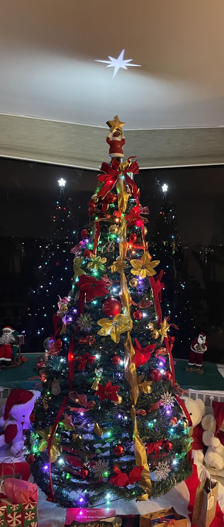 Superstar Santa Pop-Up Christmas Tree, 7FT, Pre-Lit w/ 200 LED Lights, AS SEEN ON TV, Santa Projects North Star, Opens Instantly, Fully Decorated, 7 Colors, 32 Modes w/Remote, Stores Flat customer photo 1