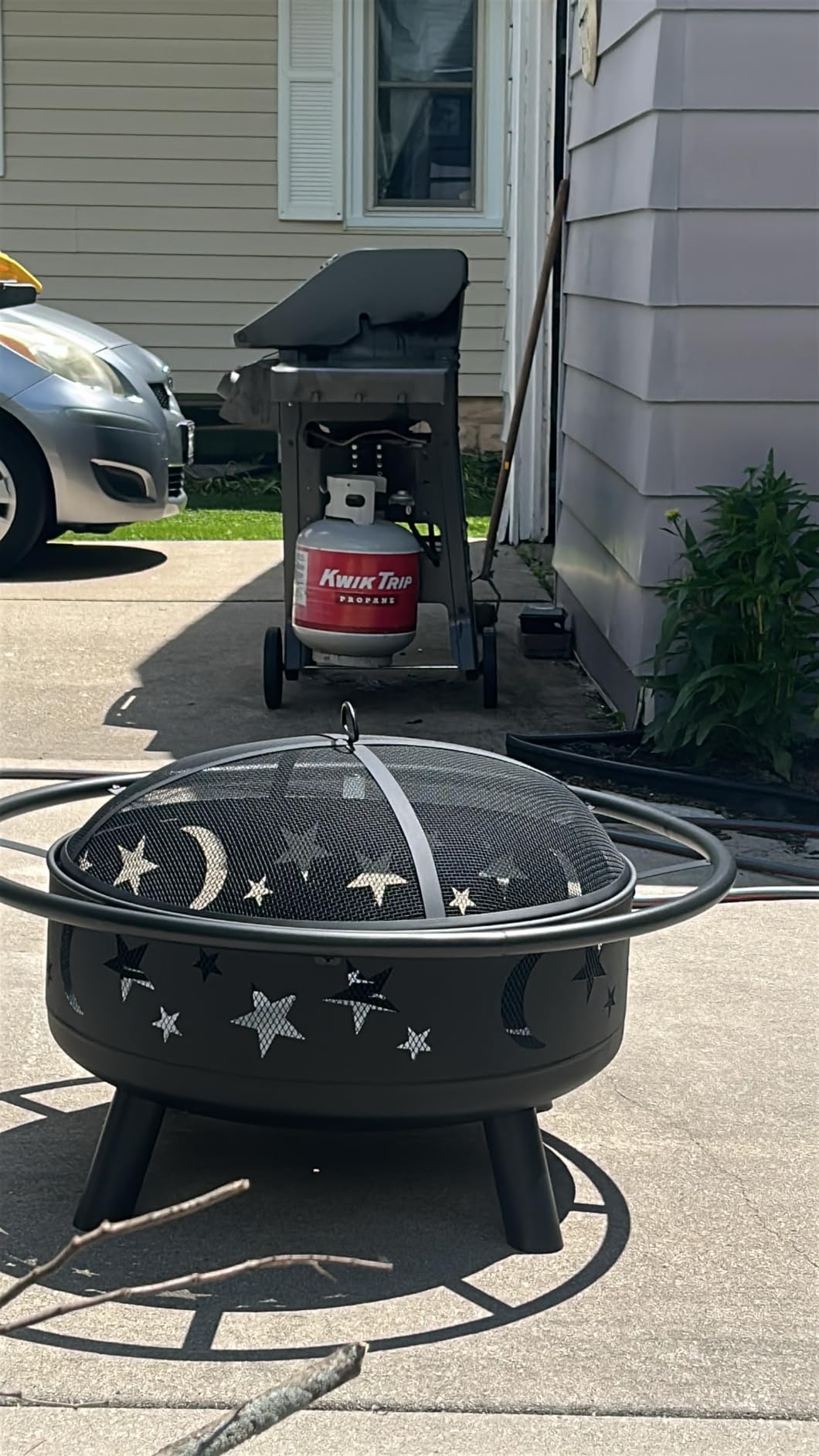 32-Inch Round Wood-Burning Fire Pit with Mesh Cover and Poker | Star and moon cutouts; metal construction for patios, camping, bonfires, Christmas, Thanksgiving, and Halloween. customer photo 1