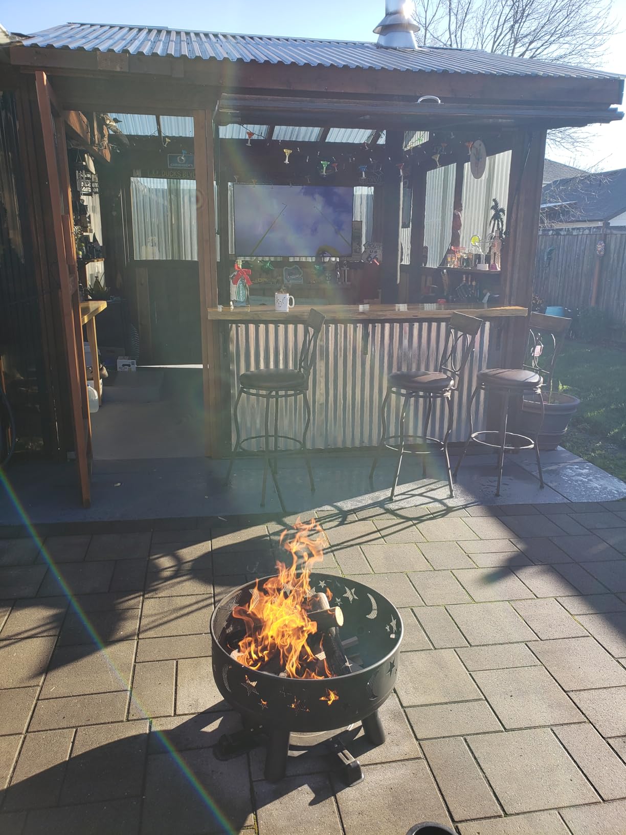 32-Inch Round Wood-Burning Fire Pit with Mesh Cover and Poker | Star and moon cutouts; metal construction for patios, camping, bonfires, Christmas, Thanksgiving, and Halloween. customer photo 2