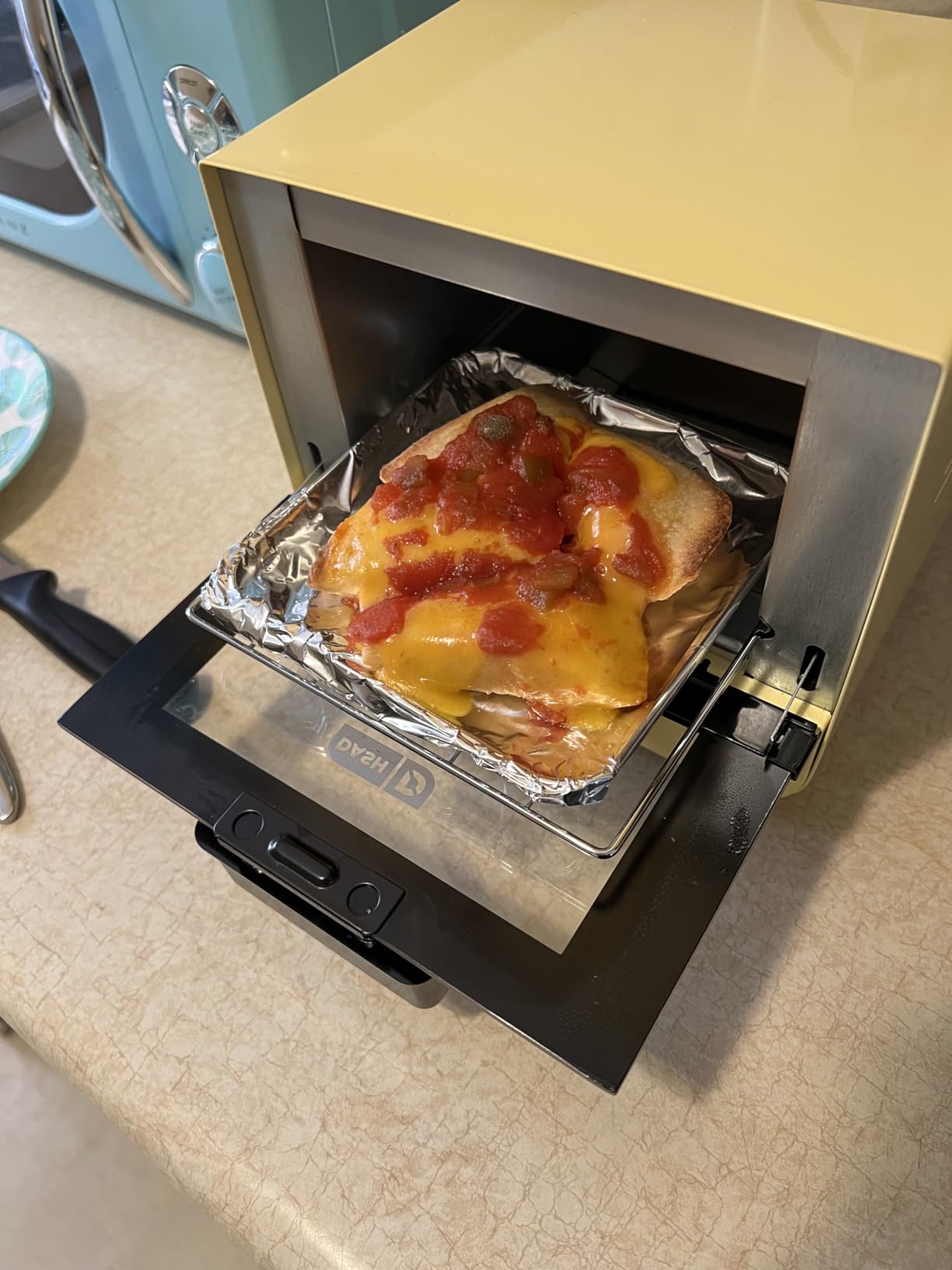 Dash Mini Toaster Oven | Small Toaster Oven for Dorms, Apartments, & Small Kitchens, Adjustable Timer Dial with Auto Shutoff, Removable Cooking Tray & Crumb Catch, Red customer photo 1