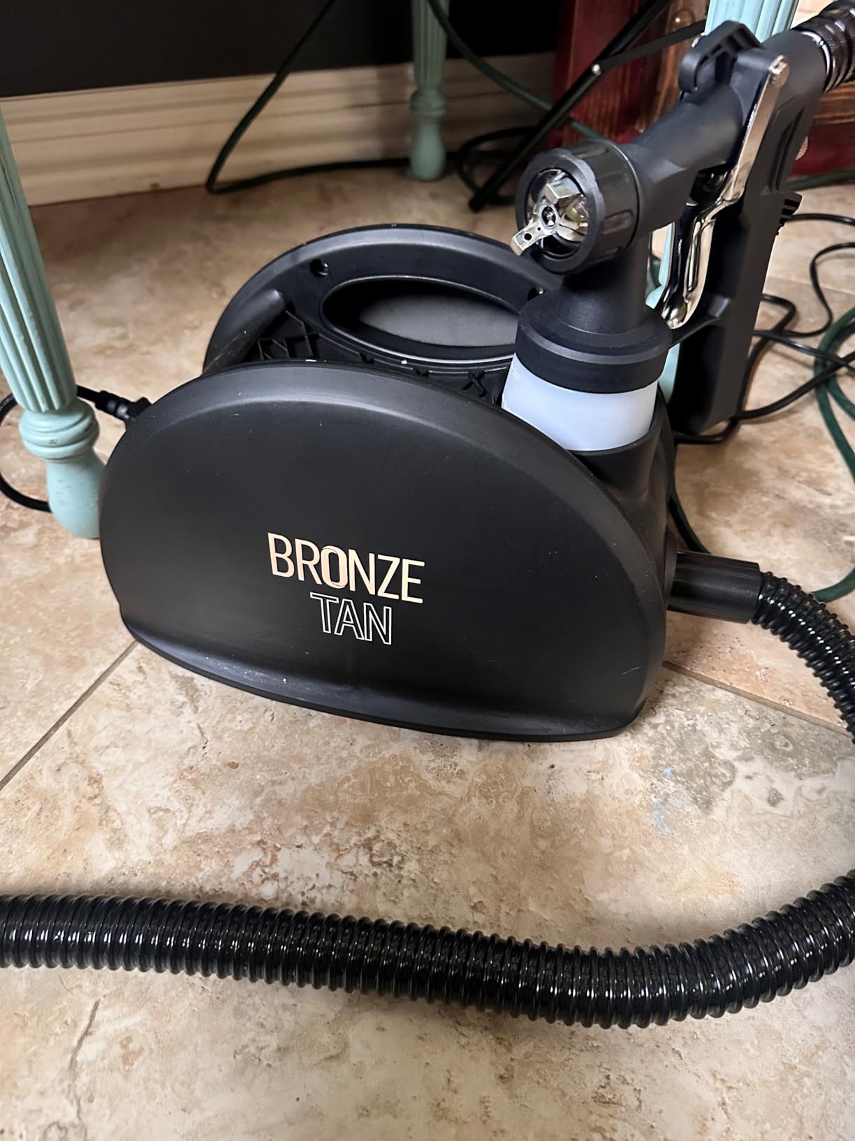 Bronze Tan Professional Spray Tan Machine with HVLP Spray Gun, 110V | Portable spray tanning system for salons and mobile artists, with a sleek design, smooth HVLP application, and 110V AC power. customer photo 1