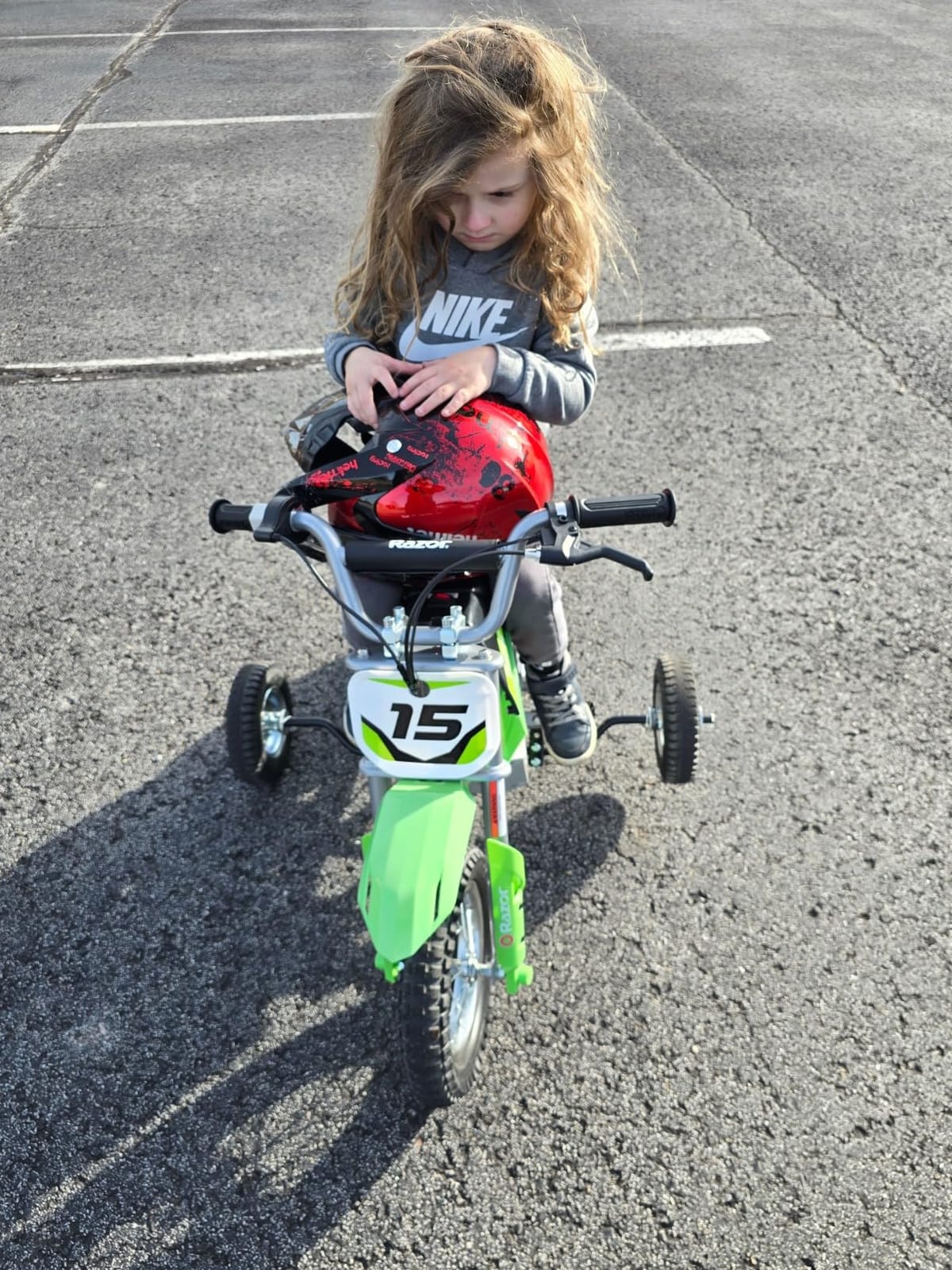 Razor MX400 Dirt Rocket Electric Bike for Kids Ages 8+, 140 Pounds Max Weight, Green – 24-Volt Battery, up to 14 Mph, 30-Minute High Speed Ride Time, Twist-Grip Throttle, 12-Inch Pneumatic Tires customer photo 2