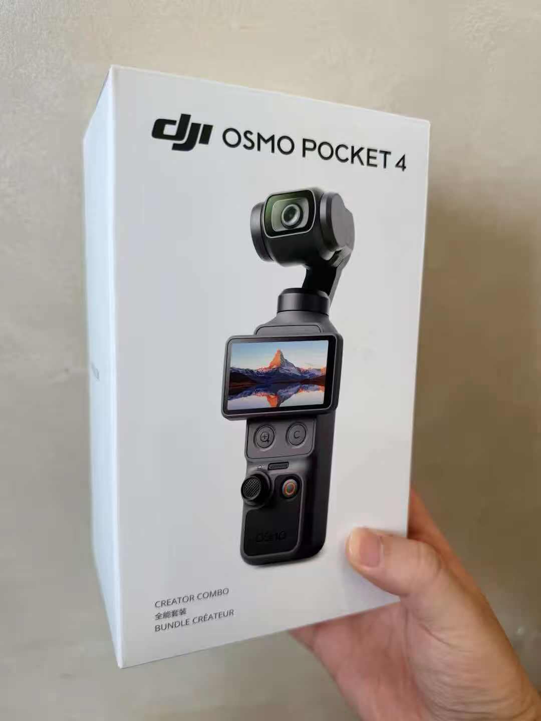 DJI Osmo Pocket 4 Creator Combo, Pocket Gimbal Vlog Camera customer photo 2